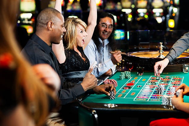 Live roulette table at olxtotoo studio with multi-camera broadcast setup showing wheel and betting layout